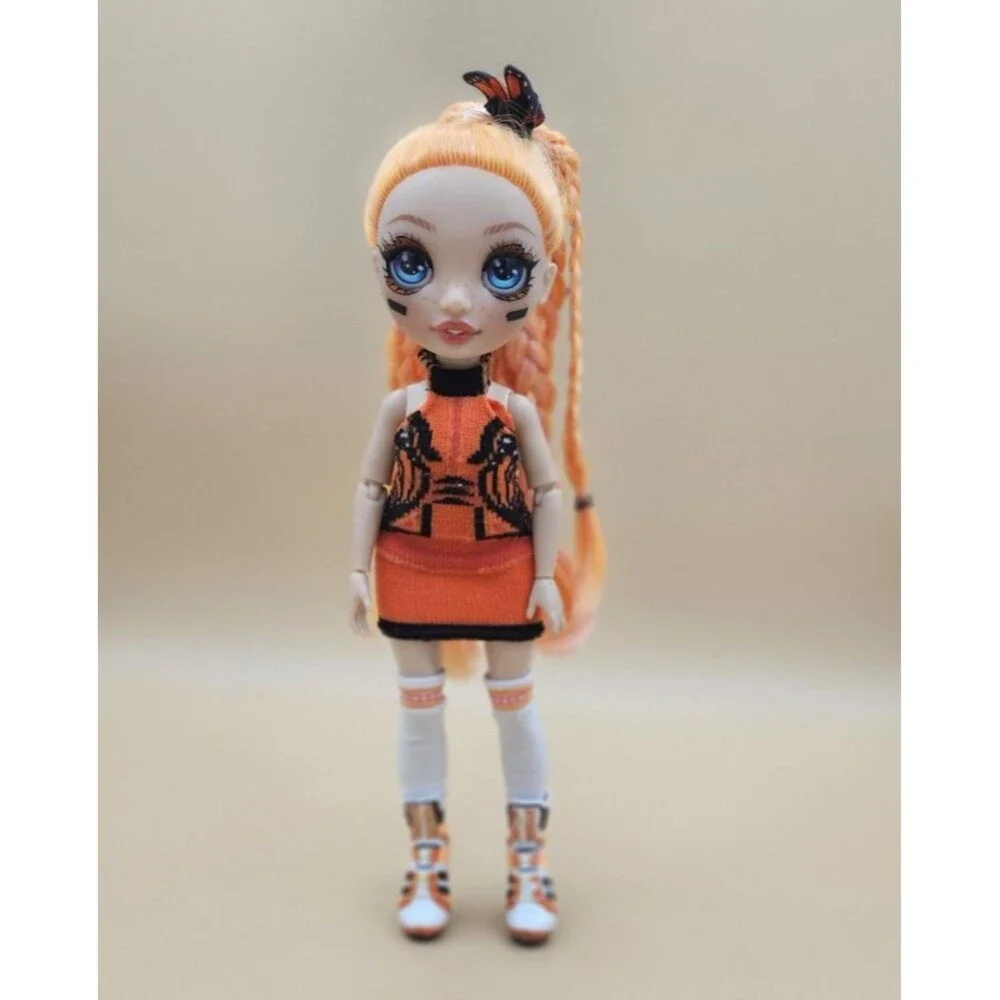 Rainbow High Junior Poppy Rowan Orange Fashion Doll Butterfly Monarch Bow